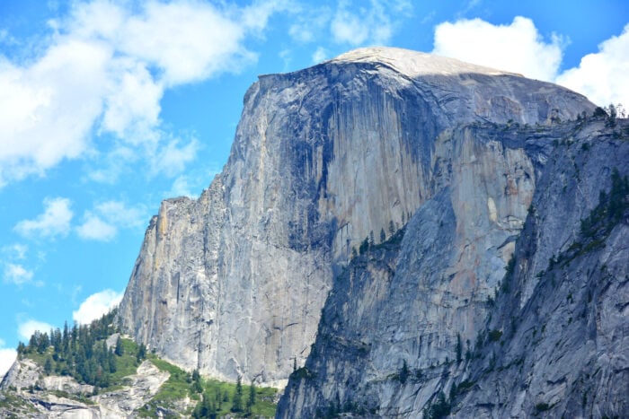 The large rock monolith called Half Dome against a blue sky